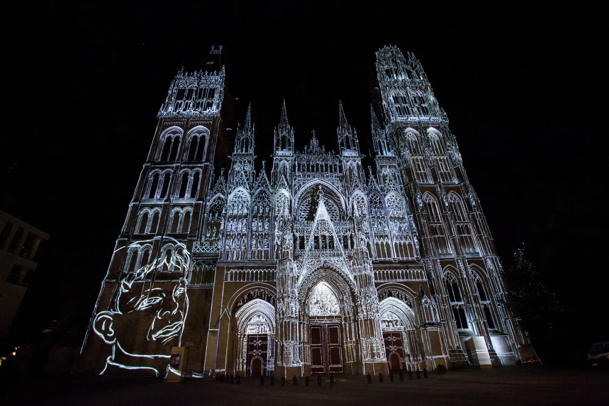Cathedral facade lit with projection mapping